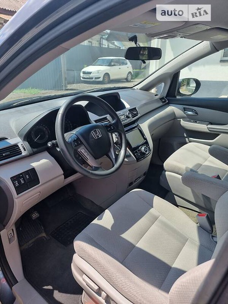 Honda Odyssey 2014  випуску Черкаси з двигуном 3.5 л  мінівен автомат за 13800 долл. 