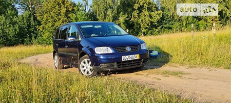 Volkswagen Touran 2004  випуску Тернопіль з двигуном 1.9 л дизель мінівен механіка за 5350 долл. 