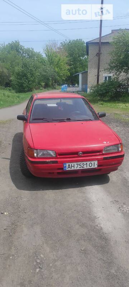 Mazda 323 1994  випуску Донецьк з двигуном 1.7 л  седан  за 2000 долл. 
