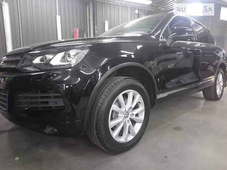 Volkswagen Touareg 2014  випуску Київ з двигуном 3 л дизель позашляховик автомат за 22300 долл. 