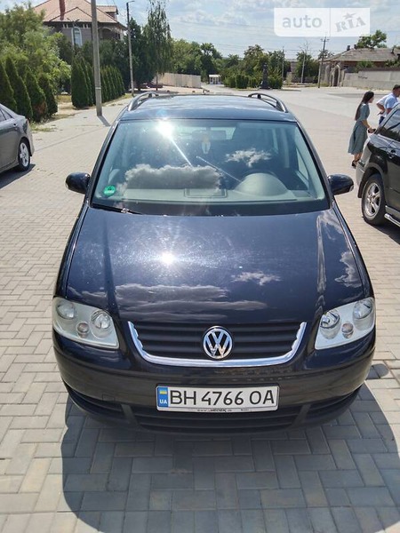 Volkswagen Touran 2006  випуску Одеса з двигуном 1.9 л дизель мінівен механіка за 6400 долл. 