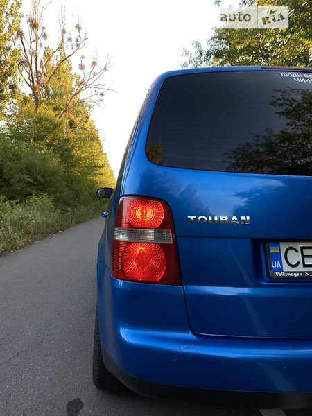 Volkswagen Touran 2006  випуску Хмельницький з двигуном 1.9 л дизель мінівен механіка за 4999 долл. 