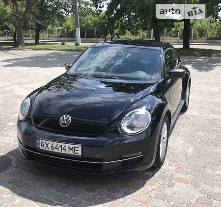 Volkswagen Beetle 2014  випуску Харків з двигуном 1.8 л бензин хэтчбек автомат за 10000 долл. 