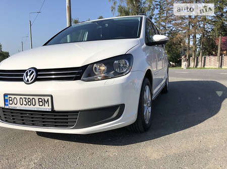 Volkswagen Touran 2012  випуску Запоріжжя з двигуном 2 л дизель мінівен автомат за 12600 долл. 