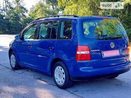 Volkswagen Touran 2005  випуску Вінниця з двигуном 0 л бензин мінівен механіка за 5500 долл. 