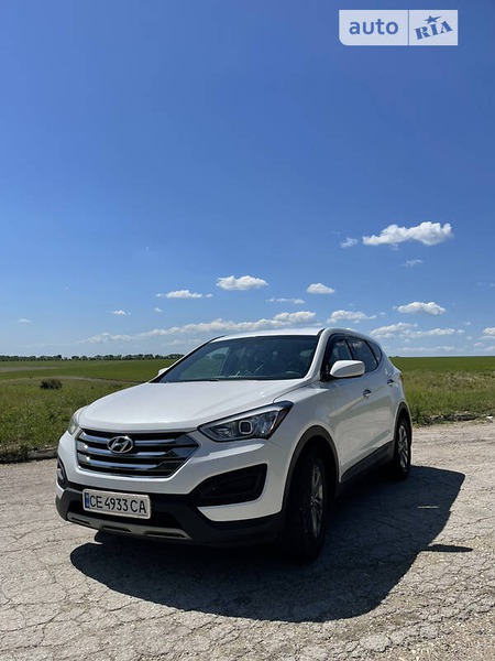 Hyundai Santa Fe 2014  випуску Чернівці з двигуном 2.4 л бензин позашляховик автомат за 13600 долл. 